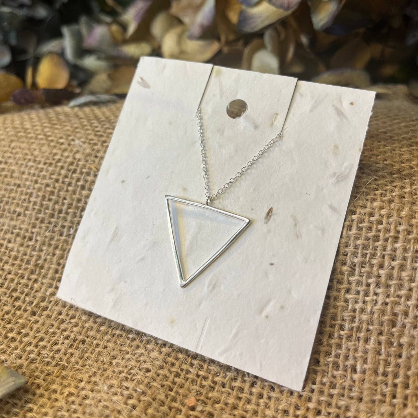 Triangle - 925 Sterling Silver NecklaceTriangle - 925 Sterling Silver NecklaceOur sterling silver necklaces make the ideal gift, featuring eco-friendly packaging that can be planted.
Material : 925 Sterling Silver
Silver weight : 1.65 g
Scribe & GrowScribe & GrowTriangle - 925 Sterling Silver Necklace