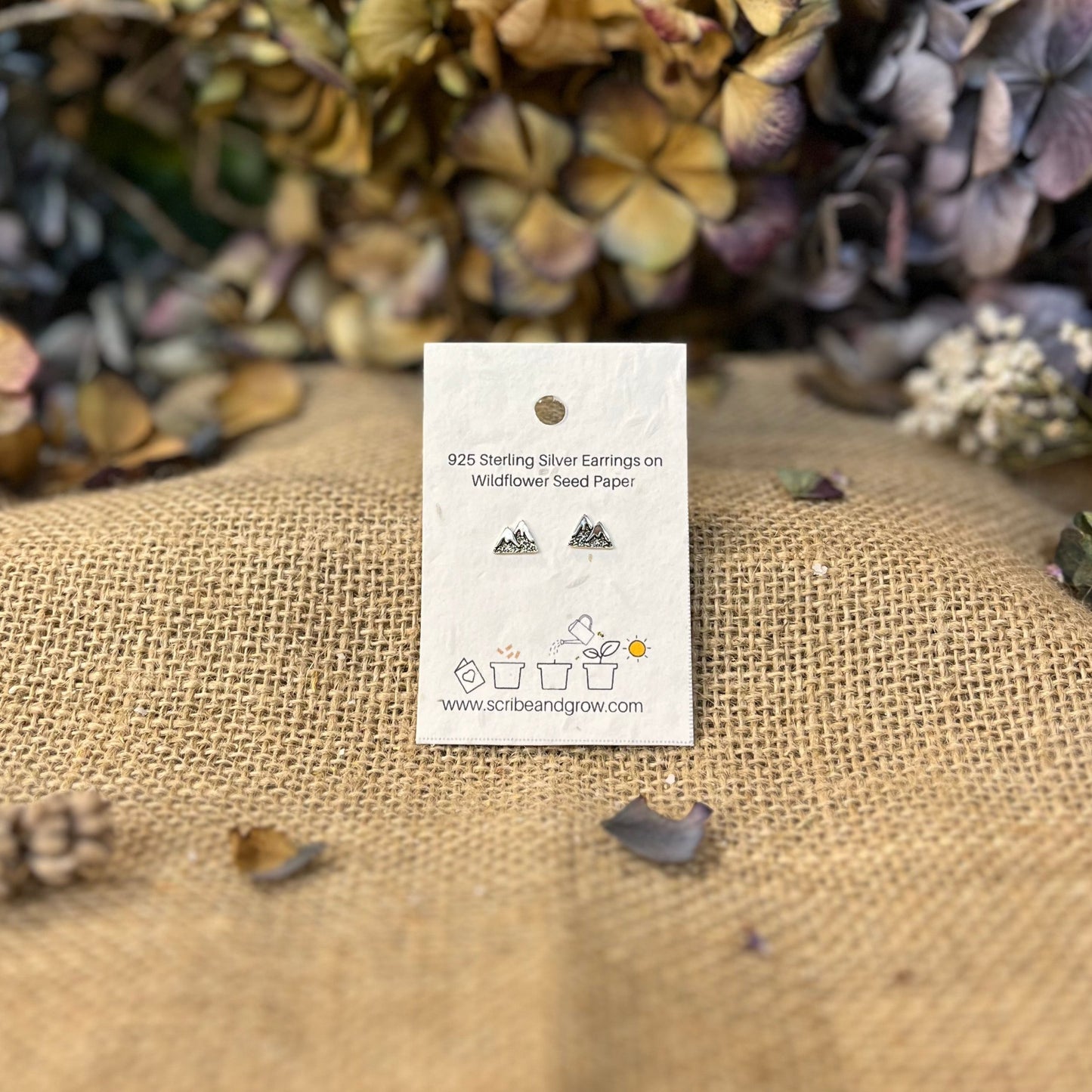Black Mountains - 925 Sterling Silver EarringsBlack Mountains - 925 Sterling Silver EarringsOur sterling silver earrings make the ideal gift, featuring eco-friendly packaging that can be planted.
Material : 925 Sterling Silver
Silver weight : 0.35 g
ParScribe & GrowScribe & GrowBlack Mountains - 925 Sterling Silver Earrings
