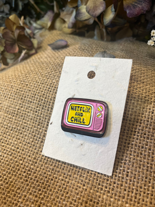 Enamel Pin - Netflix & ChillEnamel Pin / BadgeEnamel Pin - Netflix & ChillPlayful, and bold enamel pins with personality.
Enamel pins displayed on plantable wildflower seed paper – a thoughtful gift that grows!
For more details on our pinsScribe & GrowScribe & GrowEnamel Pin - Netflix & Chill