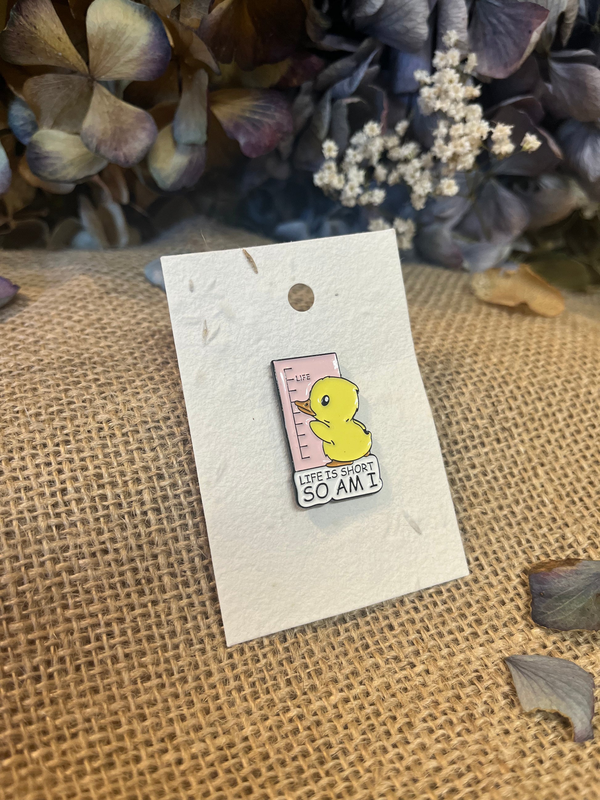 Enamel Pin -  Life Is short, So Am IEnamel Pin / BadgeEnamel Pin -  Life Is short, So Am IPlayful, and bold enamel pins with personality.
Enamel pins displayed on plantable wildflower seed paper – a thoughtful gift that grows!
For more details on our pinsScribe & GrowScribe & GrowEnamel Pin - Life