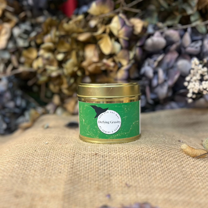 Grow Candle - Defying GravityScented CandleGrow Candle - Defying GravityInspired by the hit musical, this dark and mysterious fragrance blends whisky, vanilla, and chocolate with a bold, smoky peat undertone.
Our Grow Candles are lovinglScribe & GrowScribe & GrowGrow Candle - Defying Gravity