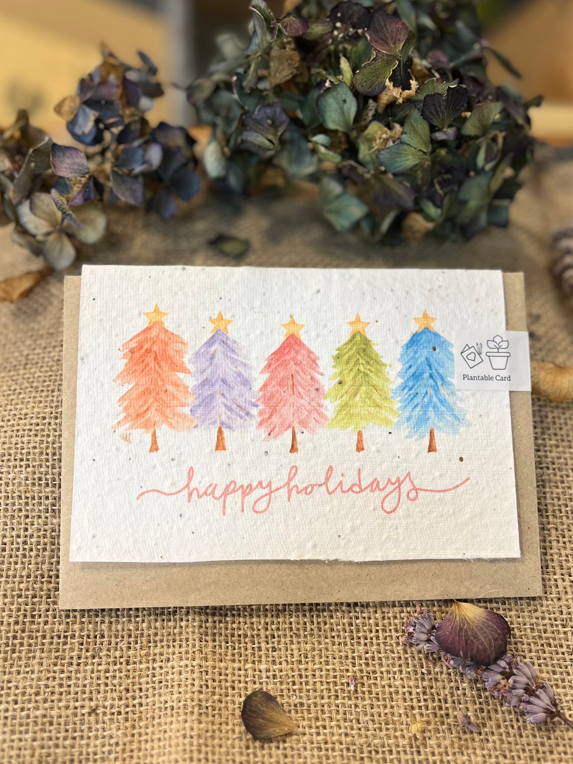 Paper Seed Card -  Happy Holidays Colourful TreesPaper Seed Card -  Happy Holidays Colourful Trees"Handmade, packed full of bee friendly flower seeds and made from 100% Pre-consumer recycled cotton"
Our seed paper cards are made here at Scribe and Grow using seedScribe & GrowScribe & GrowPaper Seed Card - Happy Holidays Colourful Trees